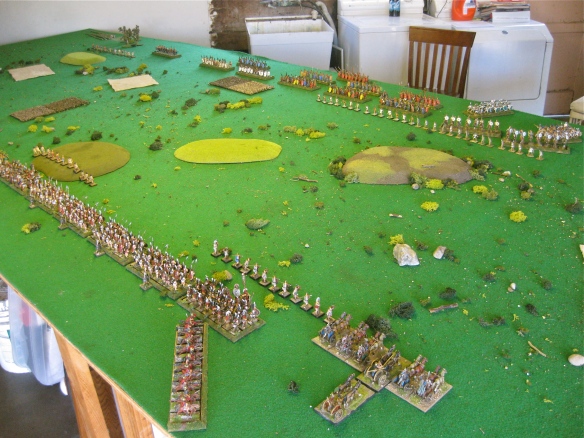 Armies deployed for battle separated by the low hills. Etruscan in foreground, Rome in distance.