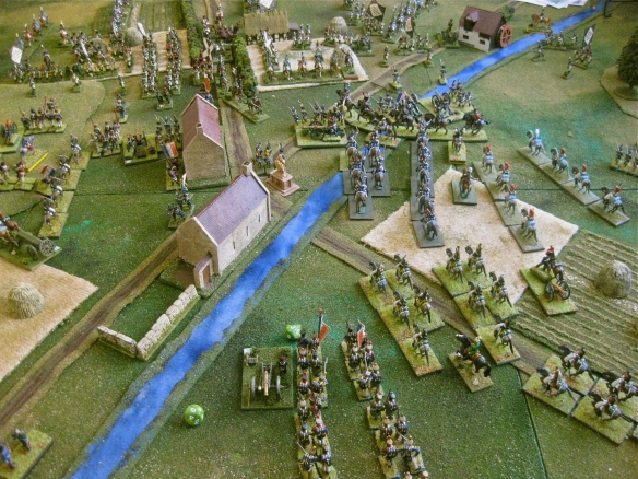 French view of their arriving  heavy cavalry as the Westphalian guard, in distance, nears the village.