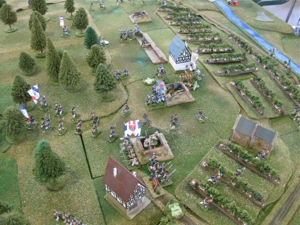 Sardinian defense weakens as the French skirmisher swarm in the rear area woods.